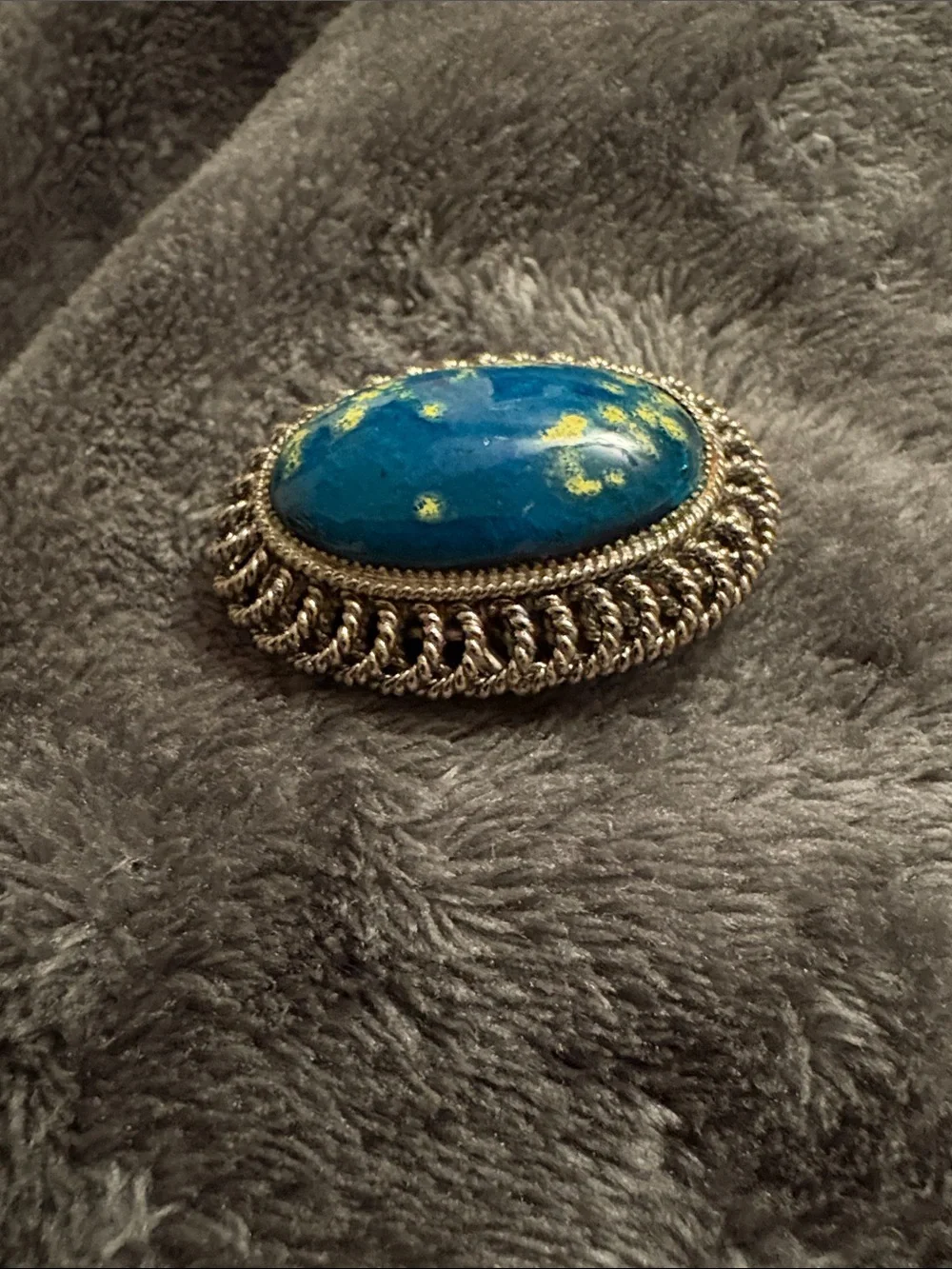 Blue and Yellow Speckled Lucite? Oval Brooch with Silver-Tone Rope Frame